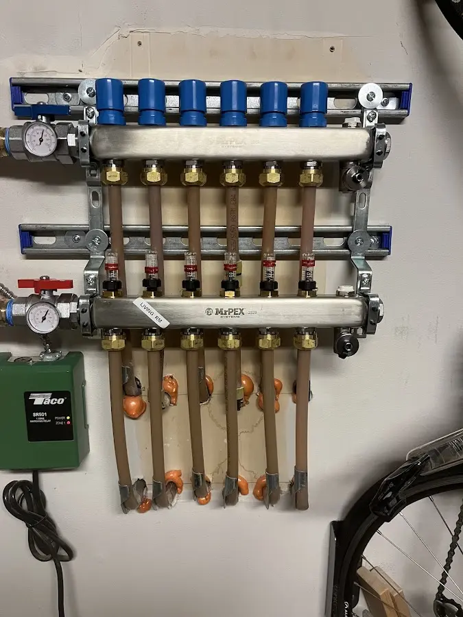 Plumber performing Water Heater Repair at a residential property in Brooklyn Park